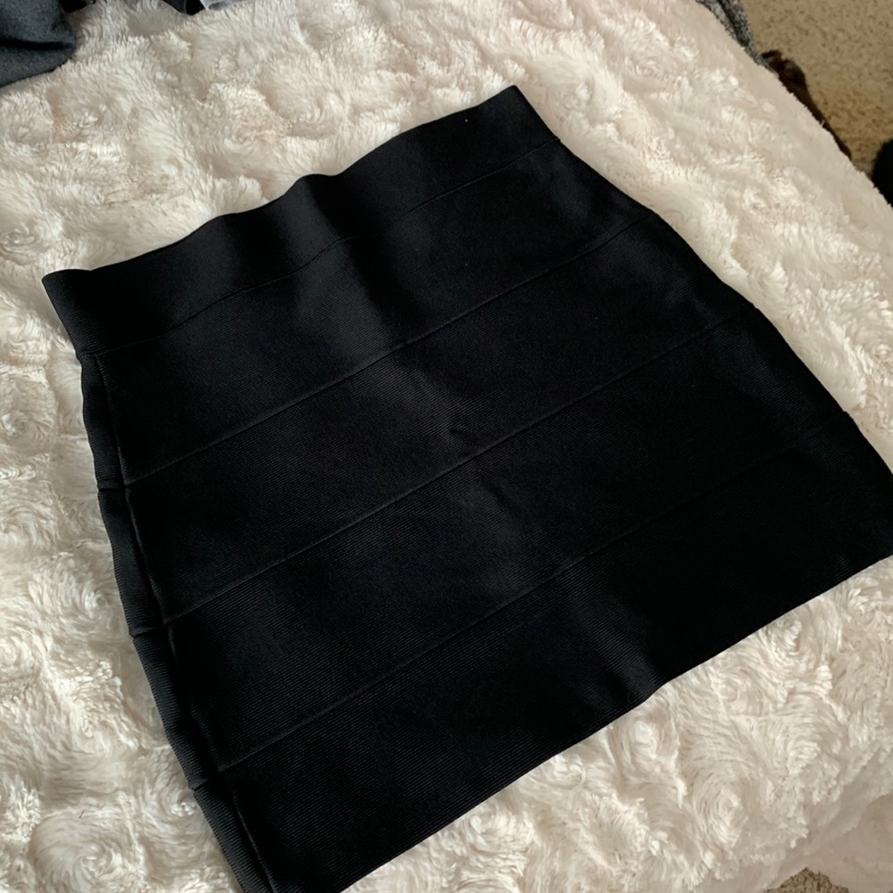 black tight fitting mini skirt